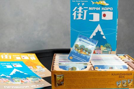 a black table topped with a box of books
